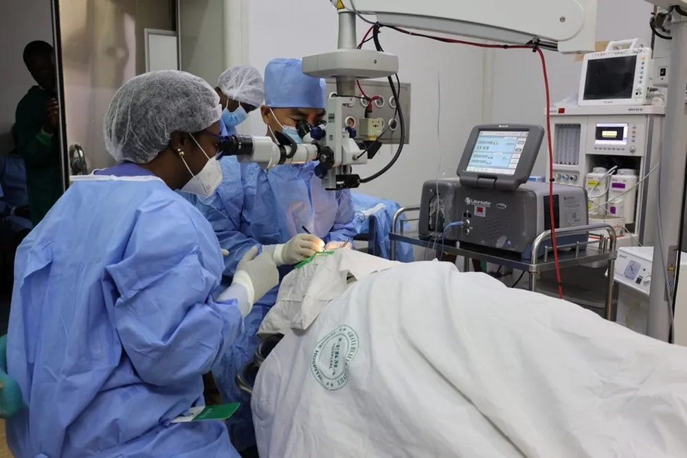 A Chinese doctor from the Chinese medical team in Ghana operates a surgery on a Ghanaian patient suffering from cataract in LEKMA Hospital in Accra, the capital of Ghana, on Feb. 13, 2023. Photo by Seth/Xinhua