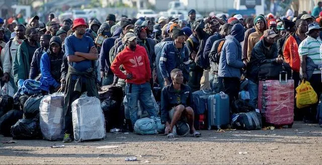 Long queues formed at Durban’s Old Drive-In site as more foreign nationals were processed in a large-scale repatriation operation under tight police monitoring ahead of planned protests. 
