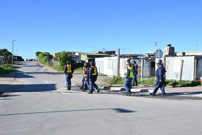 There was little sign of trouble in Gaansbaai on Tuesday morning as police conducted foot patrols. 