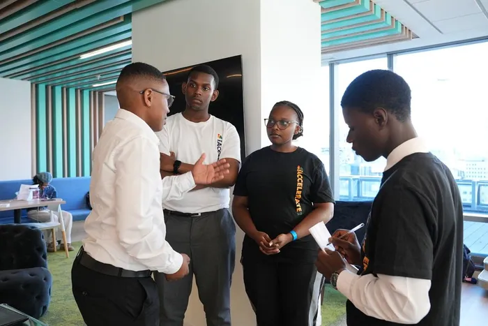 Learners engage in a Q&A session with guest speaker Mzameli Mahiyi during the iAccelerate SA Programme.