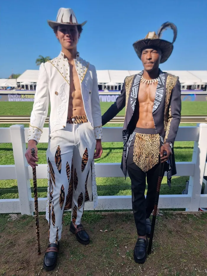 Connor Sayers with designer Sihle Shezi of the Gateway School of Fashion at the 2026 Hollywoodbets Durban July.