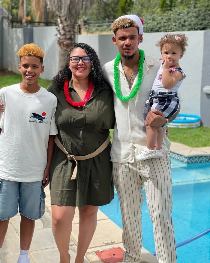 Ronwen Williams with his wife, Roshni, and their two children. 