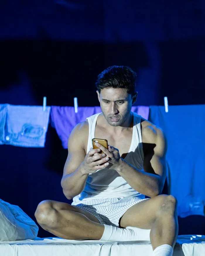 Anzio September in the powerrful solo performance, embodying multiple voices in a raw exploration of identity, masculinity and belonging.