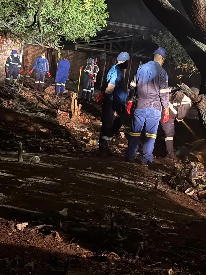 Municipal teams clean up the site of the former shelter on Mayor’s Walk, Pietermaritzburg.