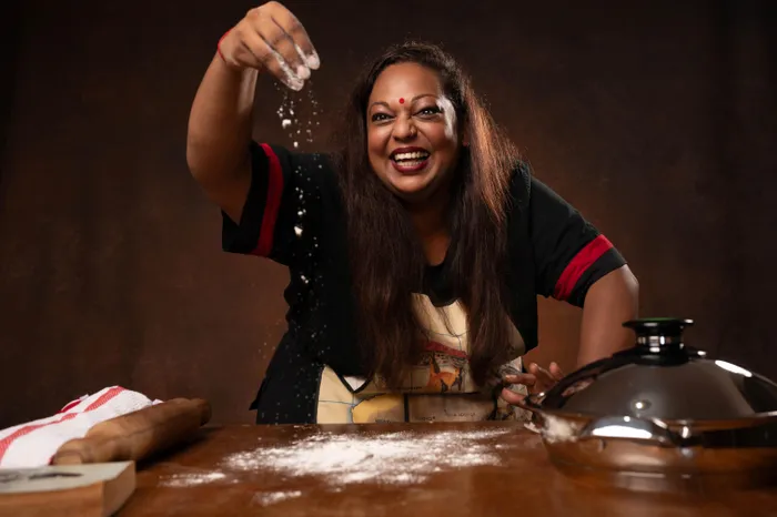 Shika Budhoo shines in her solo comedy, "Roti Queen". 
