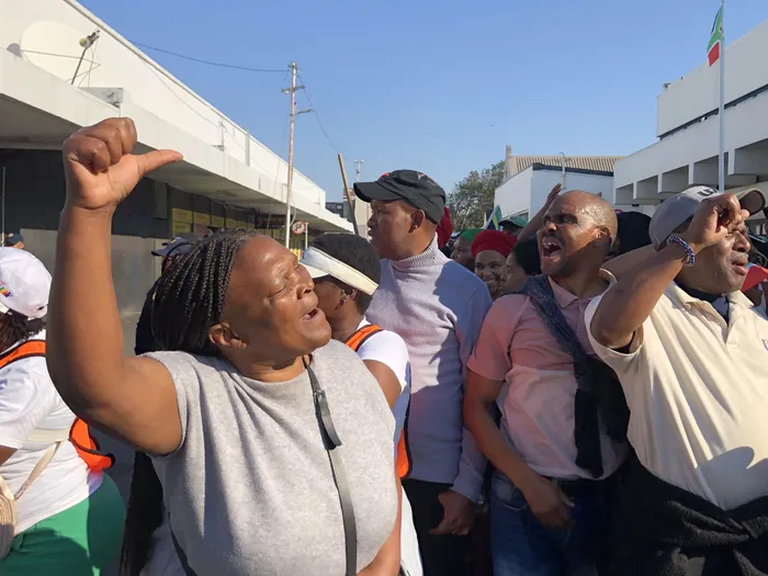 A Wynberg resident shouts “abahambe", meaning "they must go”, during a March and March protest in Wynberg linked to calls for action against undocumented foreign nationals.