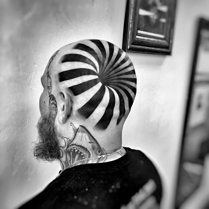 Ryan’s head tattoo looks like he has a hole in it. Picture: Instagram