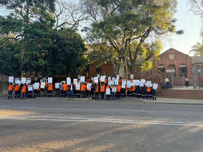 The employees of P&A Fabricators in Pinetown staged a picket, carrying placards and calling for justice.