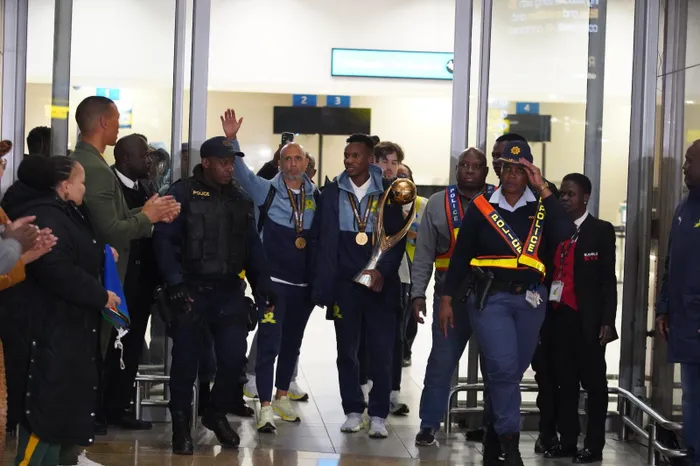 Mamelodi Sundowns arrived at OR Tambo International Airport late on Monday night to rapturous celebrations, after winning their second CAF Champions League title. Photo: Oupa Mokoena Independent Media