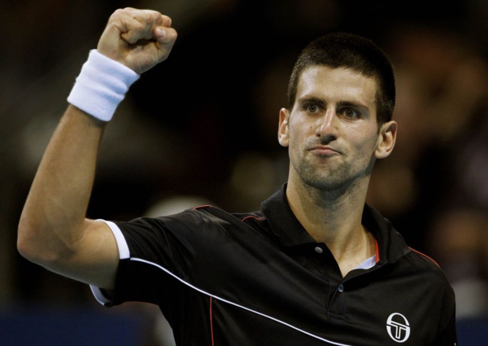 Djokovic battles through in Basel