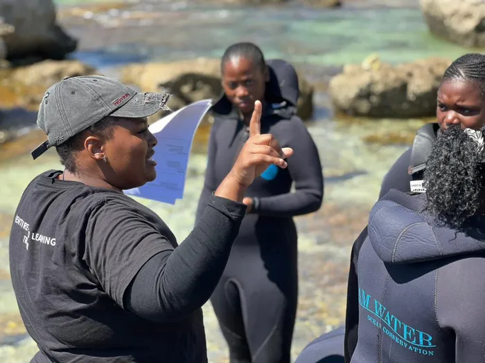 I AM WATER Facilitator, Anoyolo Maganyana, leading a workshop in Hermanus on July 27, 2025, in collaboration with Dyer Island Conservation Trust and Cape Nature.