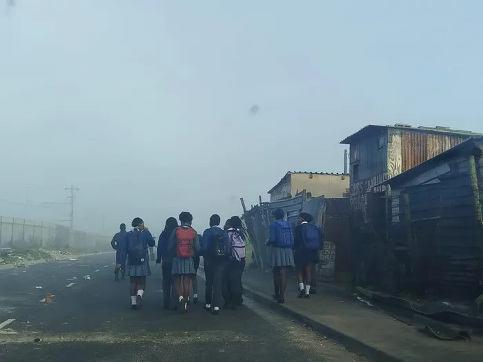 Lower Crossroads High School pupils heading home early on Monday morning.
