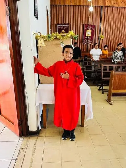 Morgan serving in church.