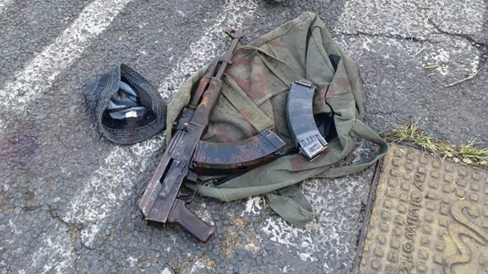 An AK47 rifle on the road