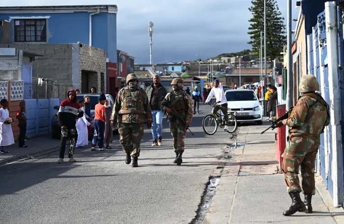 SANDF soldiers patrol in Mitchells Plain.