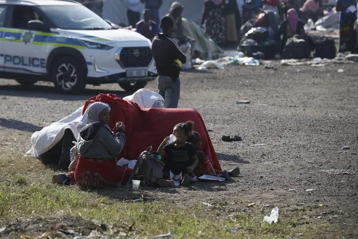 Thousands of Malawian foreign nationals, seeking refuge at the Durban drive-in site on North Beach, are going about their business, doing their laundry, shaving their hair, and selling food and other accessories, while others take advantage of Durban's warm weather, basking in the sun, waiting for their repatriation processes. 
