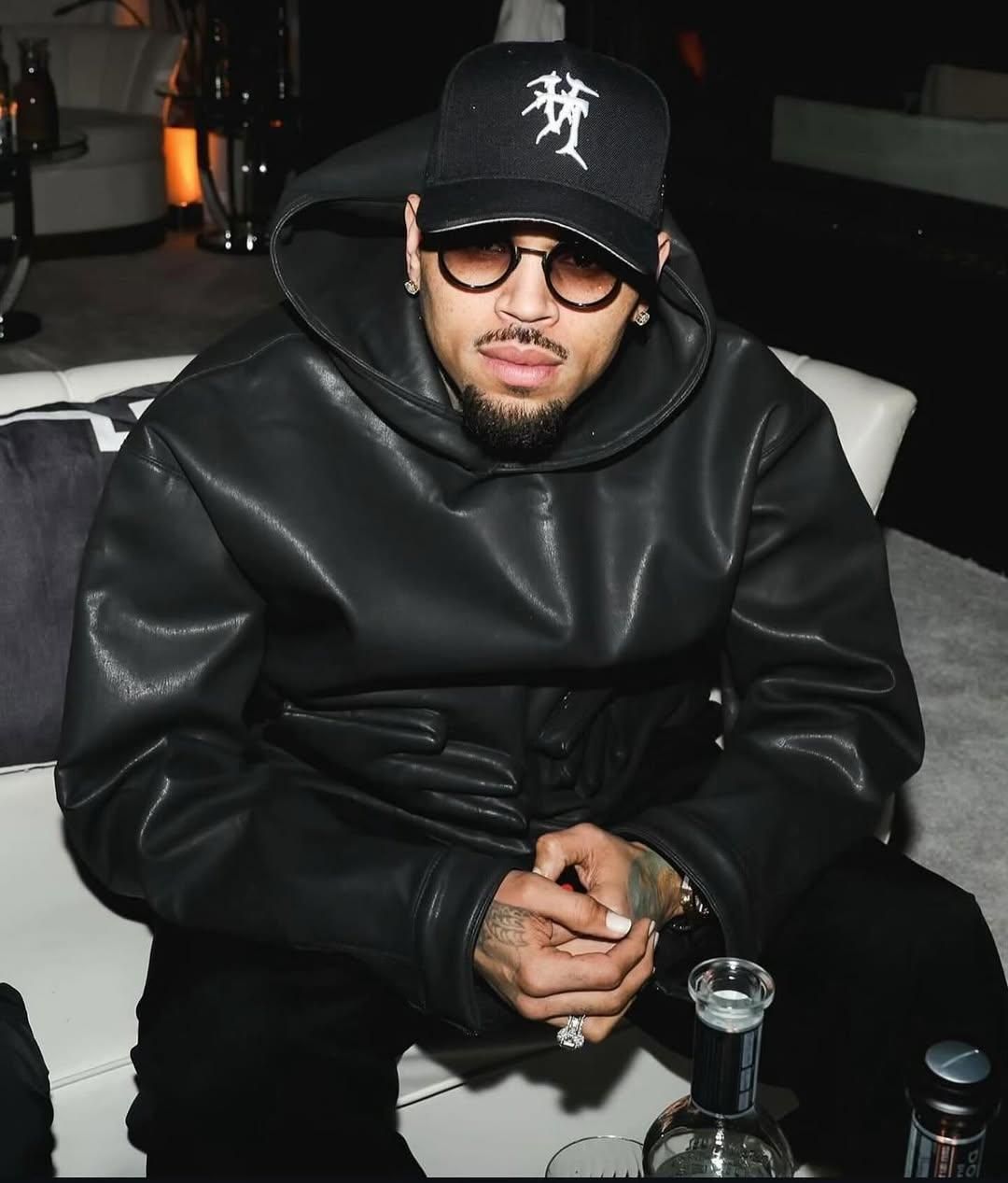 Chris Brown arrested in the UK over shocking allegations of bottle attack ...