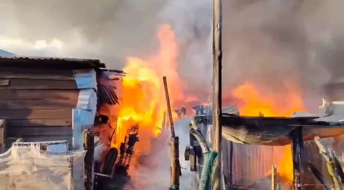 A shack burns in Oceanview, Jeffreys Bay, on Thursday during a March and March anti-immigrant protest.
