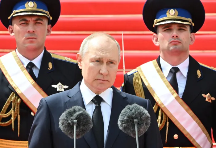 Russian President Vladimir Putin addresses members of Russian military units, the National Guard and security services to pay honour to armed forces, that upheld order during recent mutiny, in Cathedral Square at the Kremlin in Moscow, Russia. Picture: Sputnik/Sergei Guneev/Pool via Reuters