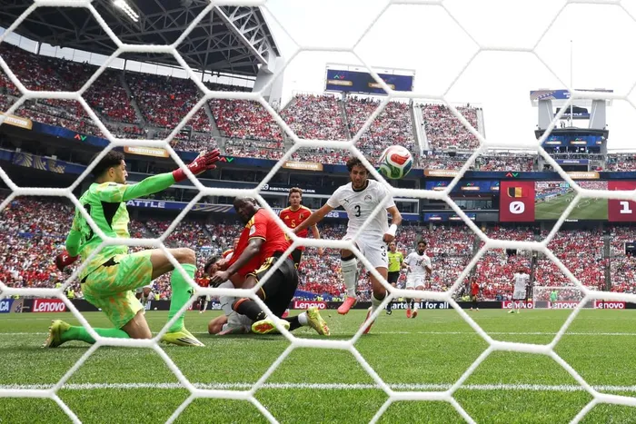 Romelu Lukaku of Belgium forces an own goal by Mohamed Hany of Egypt during the Fifa World Cup 2026 Group G match at Seattle Stadium.