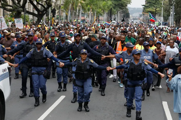 Reflecting on the lessons learned from the July 2021 unrest, South Africa's response to the June 30 protests showcases improved security measures and coordination among the government, law enforcement, and civil society, but challenges remain in addressing the root causes of instability.
