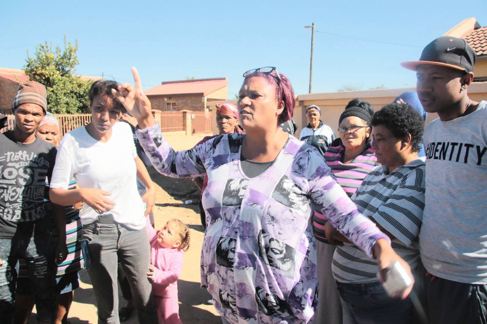 Residents take to the streets over road project