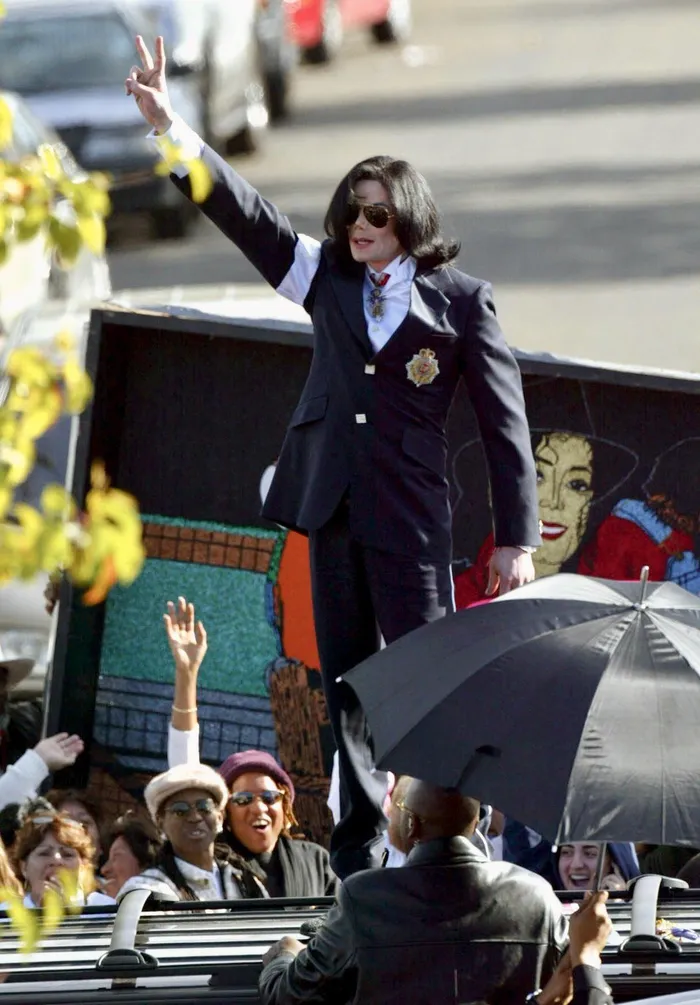 Michael Jackson greeting his fans during his infamous trial.