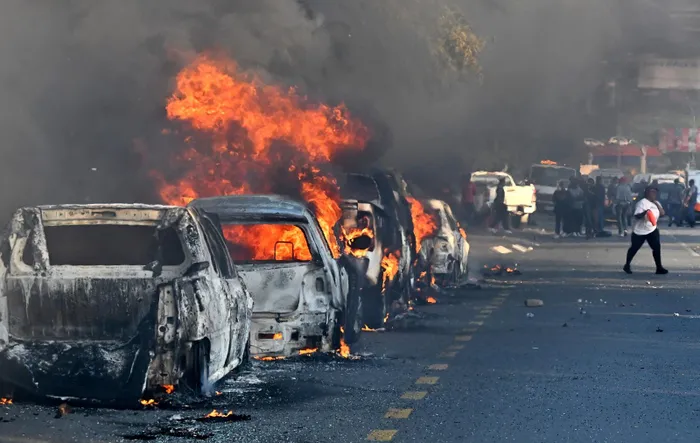 Police vow arrests after 24 vehicles torched in Durban and Soweto protests.