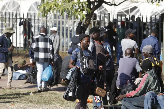 Thousands of Malawian foreign nationals, seeking refuge at the Durban drive-in site on North Beach, are going about their business, doing their laundry, shaving their hair, and selling food and other accessories, while others take advantage of Durban's warm weather, basking in the sun, waiting for their repatriation processes. 