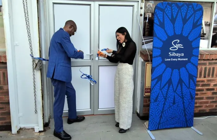Mark  Kapyadorvinx, the co-founder of Art Vision Academy, and Sorisha Naidoo, a trustee of the Sibaya Community Trust, at the ribbon cutting. 