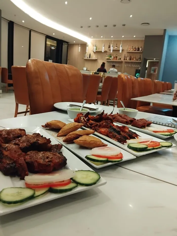 Starters included lamb chops, samosas, tandoori prawns and lamb shami kebabs.