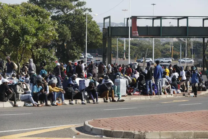 Thousands of Malawian foreign nationals, seeking refuge at the Durban drive-in site on North Beach, are going about their business, doing their laundry, shaving their hair, and selling food and other accessories, while others take advantage of Durban's warm weather, basking in the sun, waiting for their repatriation processes