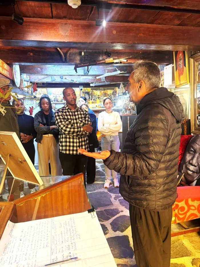 Founder and curator Igshaan Higgins engaging with IOL interns during their visit to the Cape Heritage Museum. 
