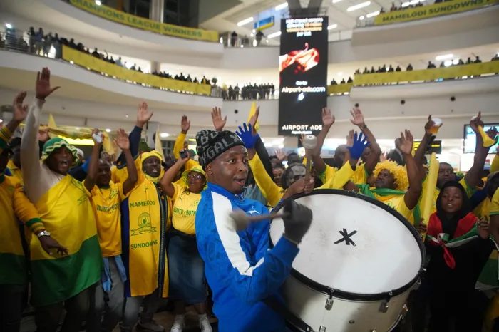 Mamelodi Sundowns arrived at OR Tambo International Airport late on Monday night to rapturous celebrations, after winning their second CAF Champions League title. Photo: Oupa Mokoena Independent Media