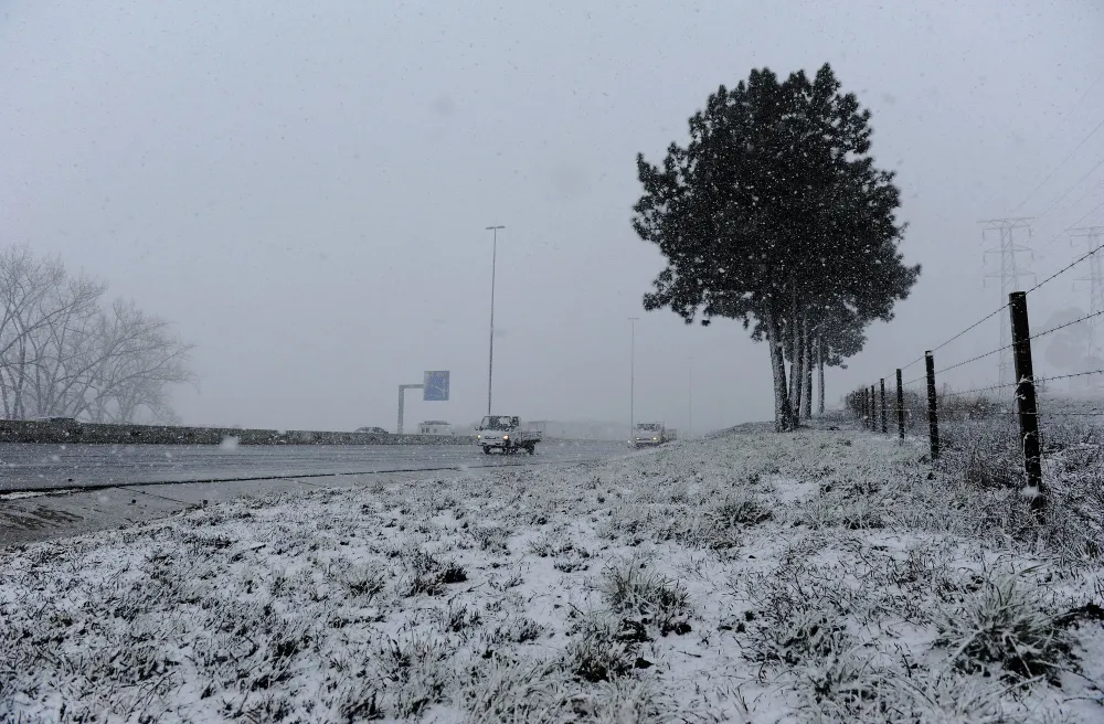 A vehicle driving in snow
