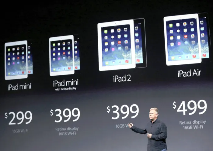 Phil Schiller, the senior vice-president of worldwide marketing at Apple, introduces the new range of iPads during an Apple event in San Francisco on Tuesday. Despite pressure from cheaper rivals, Apple has raised the price of some of its new models. Photo: Reuters
