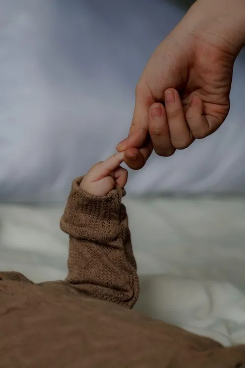 Newborn baby abandoned in bushes with umbilical cord still attached gets a second chance