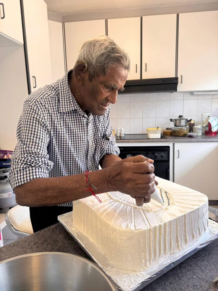 At the age of 100 Dennis Naidu decorated his own birthday cakes