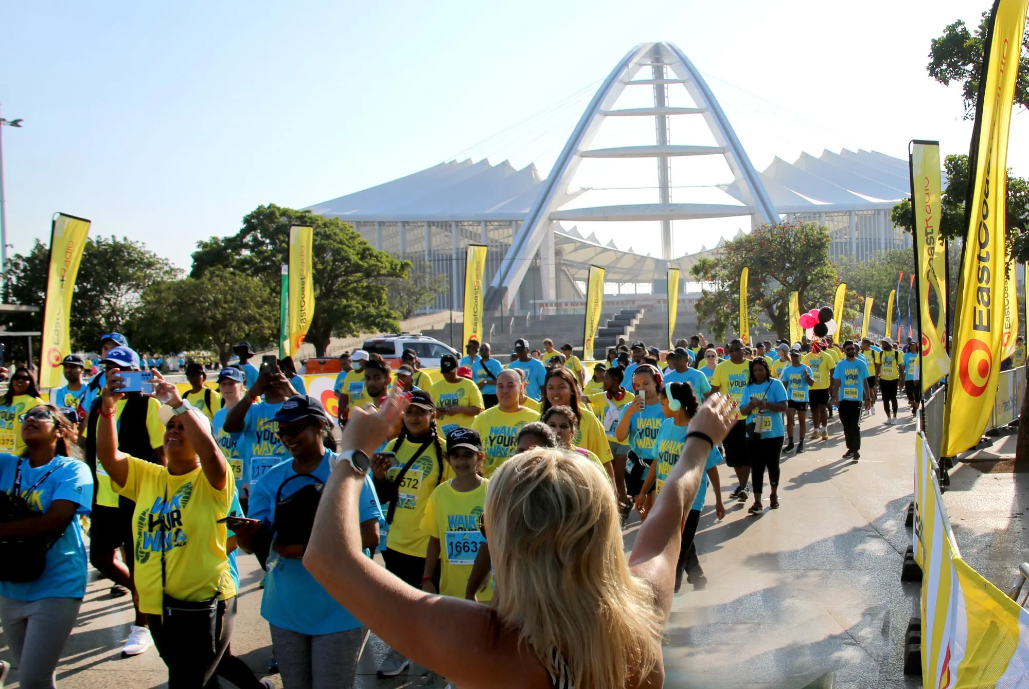 Sea of turquoise and yellow floods ECR Big Walk - Vimarsana News