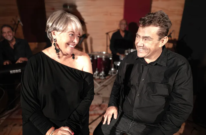 Singers Kim Kallie and David Ricky.