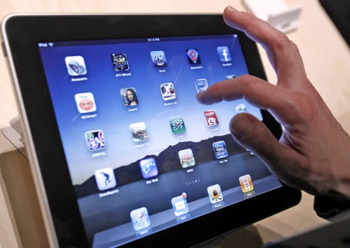 The iPad is shown after it was unveiled at the Moscone Center in San Francisco, Wednesday, Jan. 27, 2010. (AP Photo/Marcio Jose Sanchez)