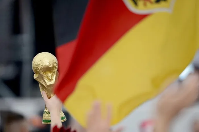 Joy and despair: Germany lift their fourth World Cup trophy in Brazil while the host nation processes the shock of a lifetime. Photo: AFP