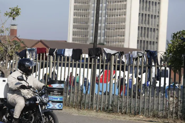 Thousands of Malawian foreign nationals, seeking refuge at the Durban drive-in site on North Beach, are going about their business, doing their laundry, shaving their hair, and selling food and other accessories, while others take advantage of Durban's warm weather, basking in the sun, waiting for their repatriation processes