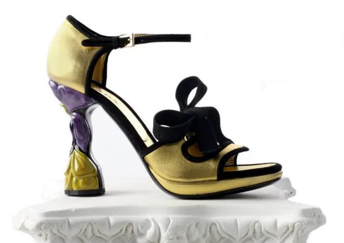 They're weird, bizarre and utterly ugly, yet they qualify as spring's must-have pair of shoes. They are Prada's flower-heeled Mary Jane sandals.