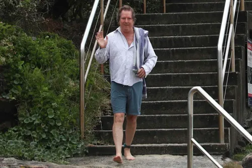 Beachgoer walks into Australian Fashion Week show at Tamarama Beach
