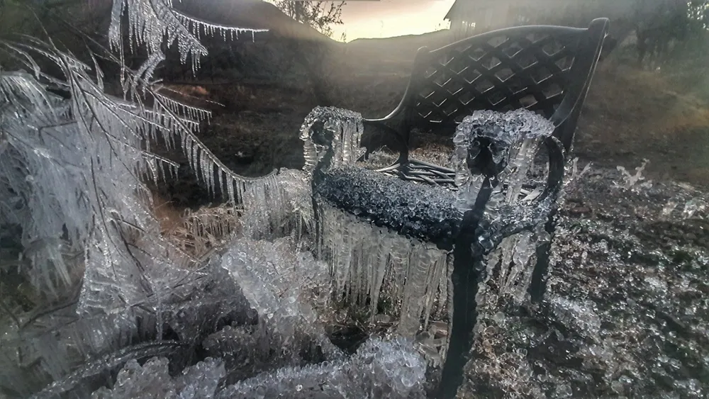 Icicles form around a chair. 
