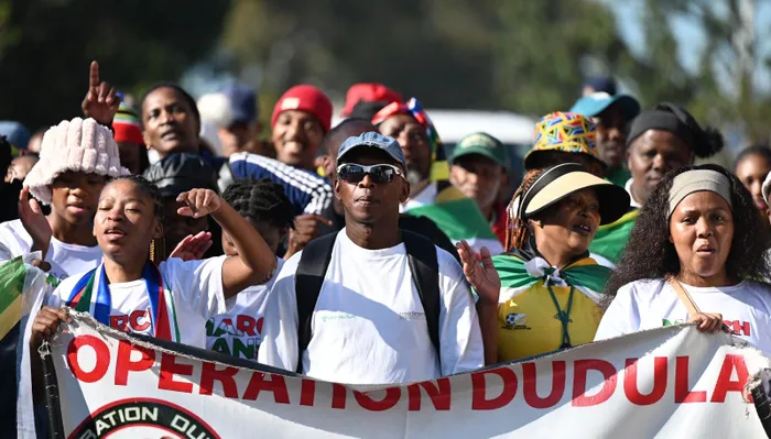 Members of civic organisations protesting in Cape Town's CBD on 30 June 2026, demanding stronger enforcement against illegal trading and calling for the removal of undocumented foreign traders from public trading spaces.