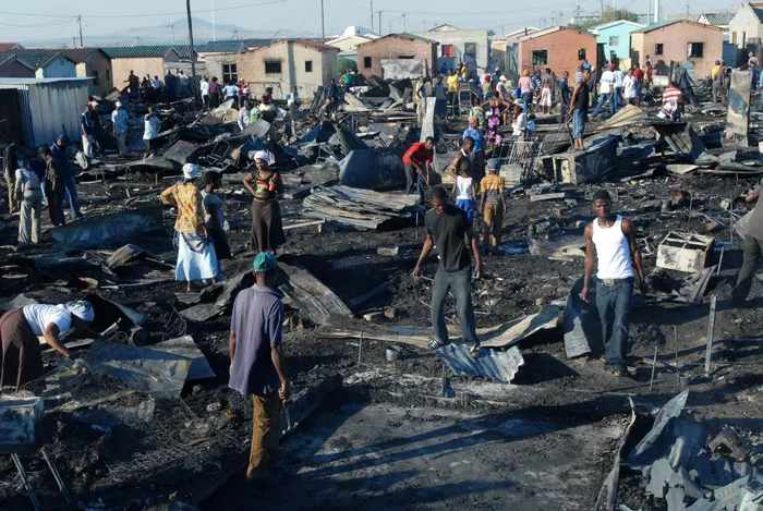 A fire had gutted 120 shacks just two days before New Year’s Day, leaving hundreds of people destitute.