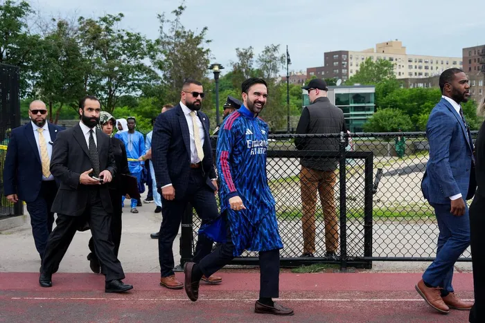 New York Mayor Zohran Mamdani in his Arsenal themed kurta for an Eid celebration.