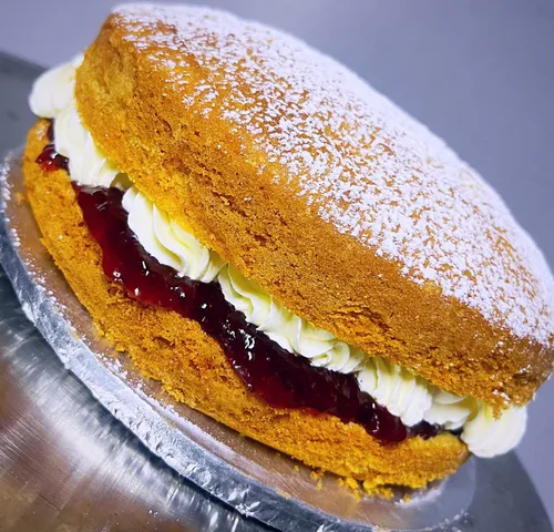 Enjoy the timeless charm of a classic Victoria Sponge Cake